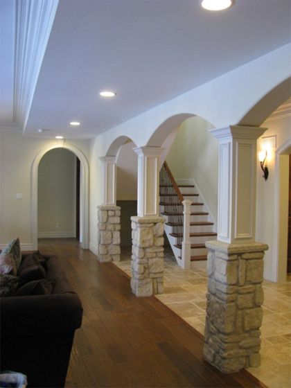 CULTURED STONE COLUMNS AND TILE FLOOR