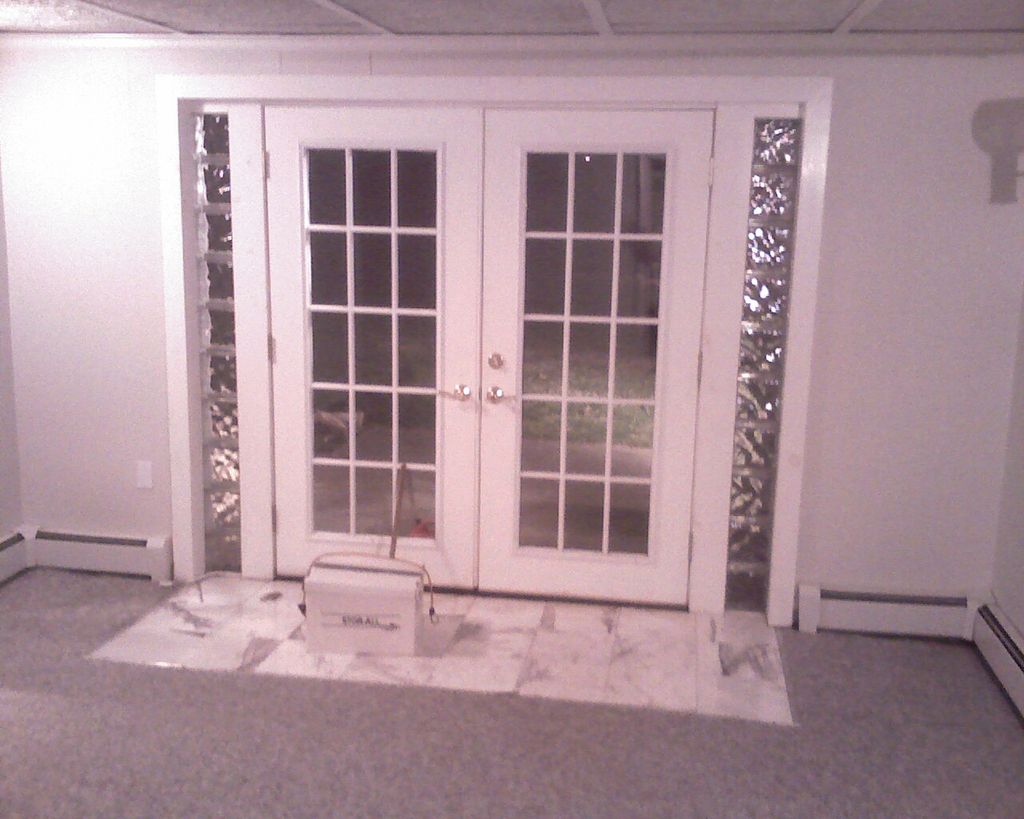 French doors with glass block & Marble entry way