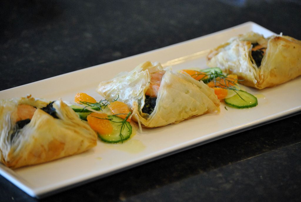 Salmon Florentine in filo, with a mandarin orange,