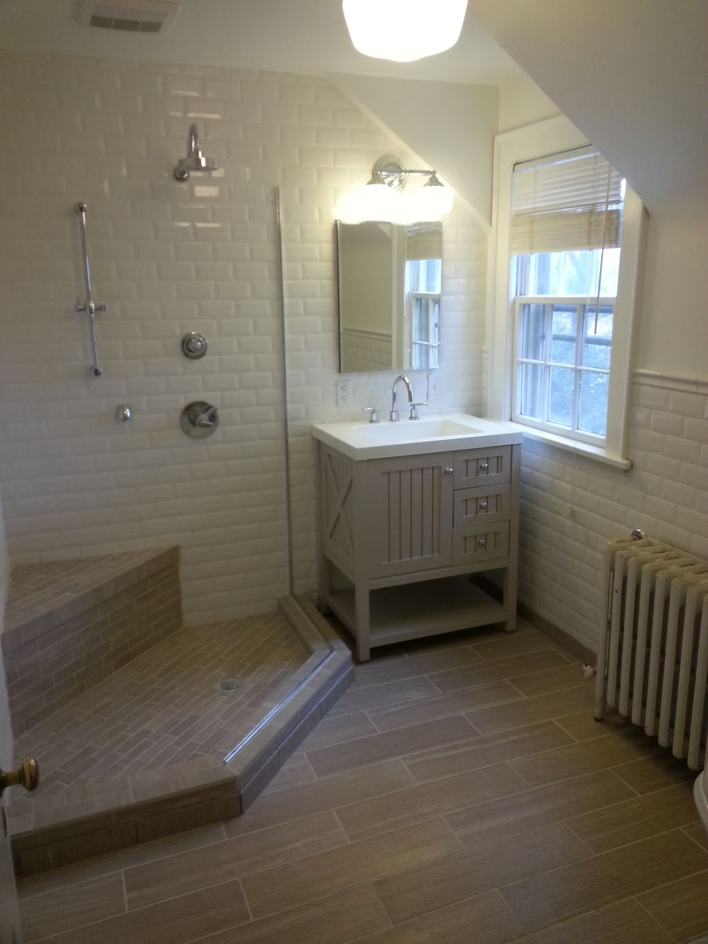 Nearly finished bathroom in a 85 yr old house on t