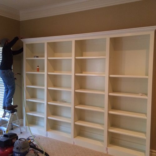 10' Bookcase with adjustable shelves. 3"crown mold