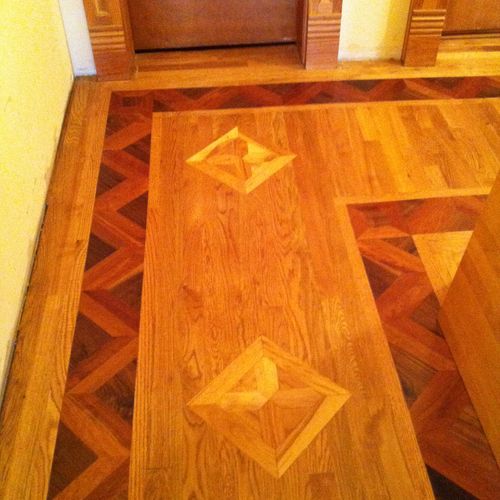 We used a few pieces of the parquet from the foyer