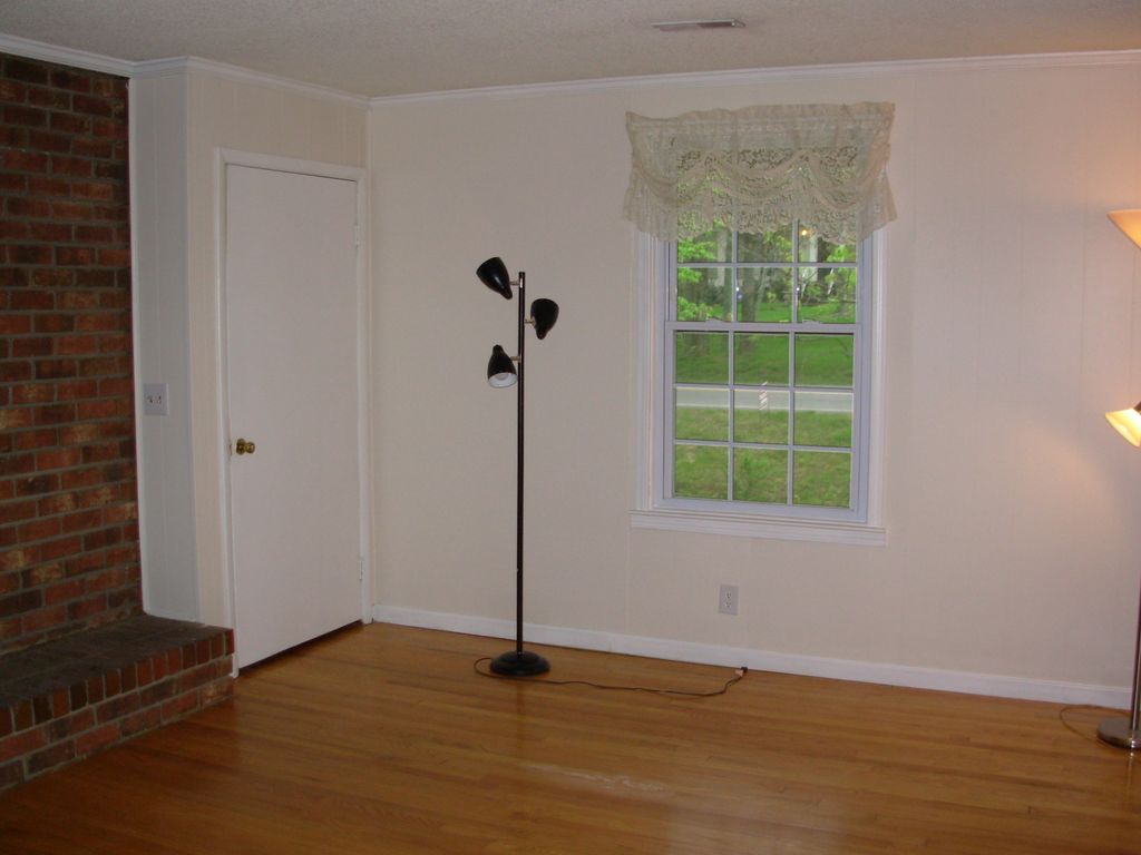 stripped hard wood refinished and painted floor wa