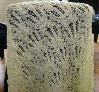 This hand knit country cable blanket looks like la