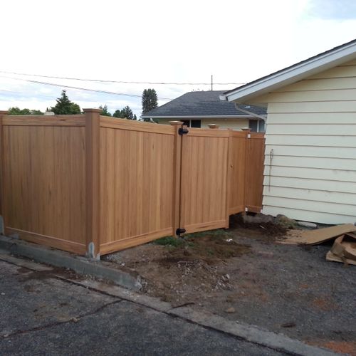Fence installs. This is a vinyl fence installed to