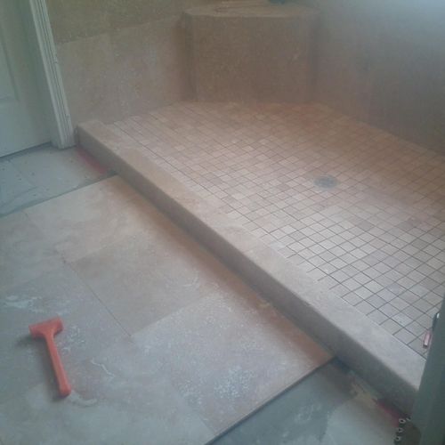 travertine shower floor in progress
