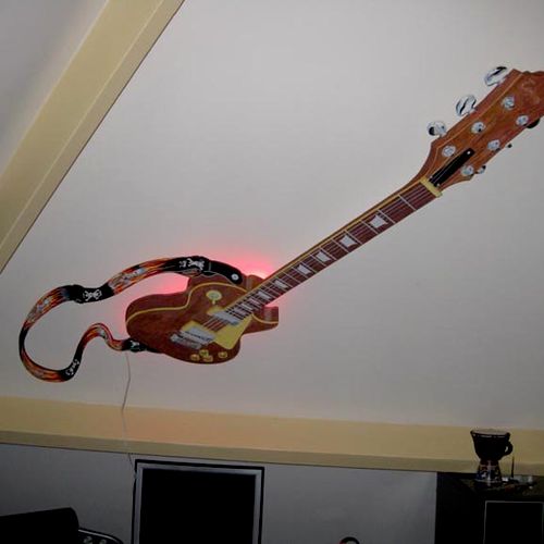 Favorite guitar on a ceiling