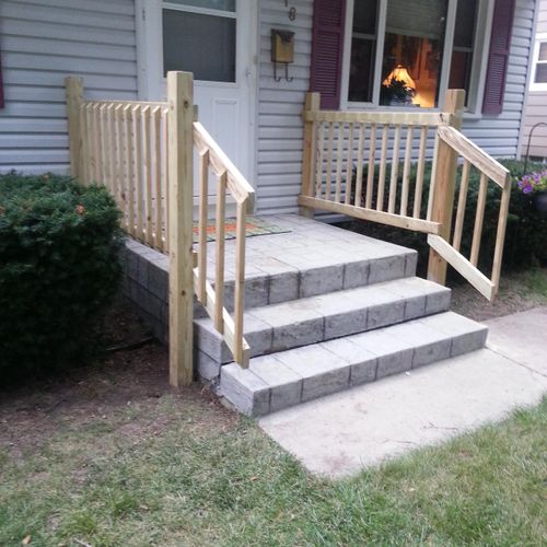 Finished front porch safety railing. - Contractor 