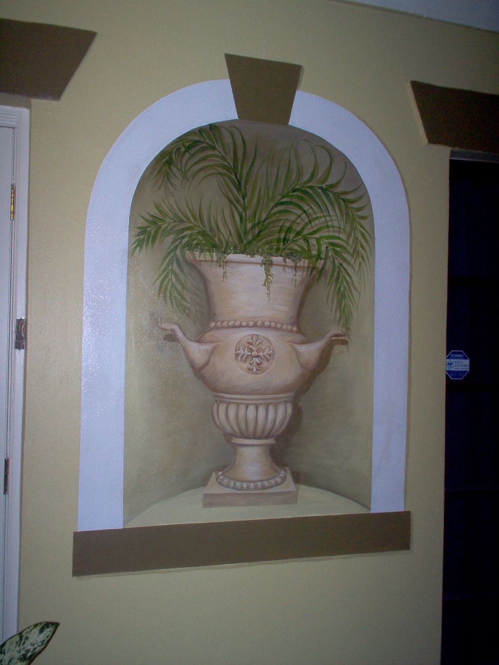 Trompe L' Oeil mural outside residence.