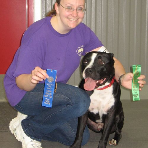 Erin and her personal dog, Andre, having won first
