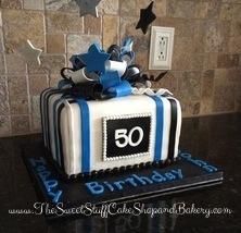 50th Birthday cake.  Bows and stripes
