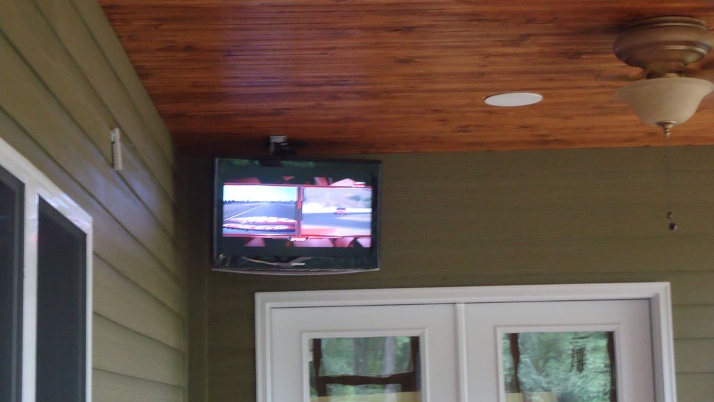 Mounting TVs outside on a porch or patio is becomm