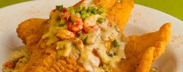 Catfish Carter
(Crawfish Etouffee over Catfish) se