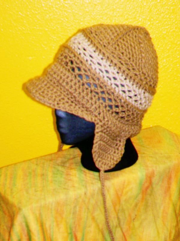 Ear flap style with an open weave stitch pattern. 