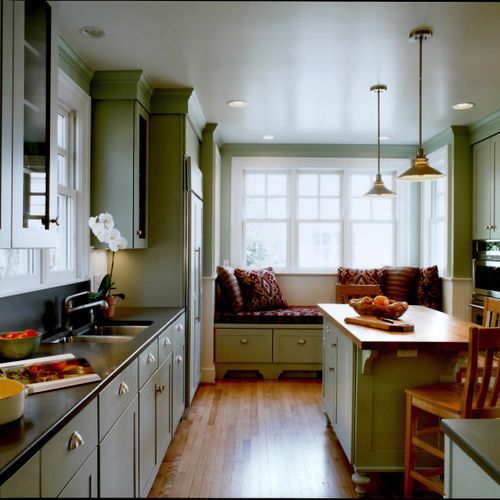 Kitchen with soapstone counters and painted cabine