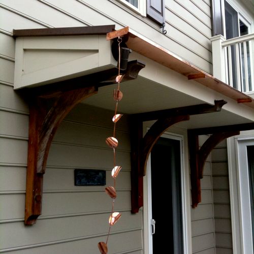 Custom made gutter with copper rain chain we made 