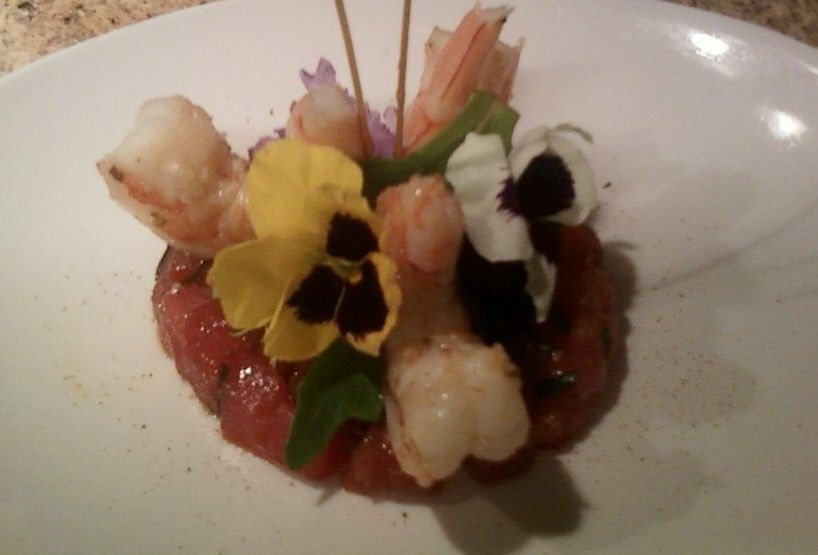 Ahi tuna poke with chili glazed prawns and edible 