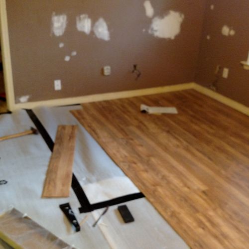 Tongue and groove flooring install /w painting of 