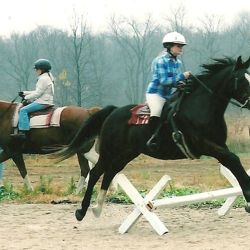 Jumping for joy on horseback at Academy Of Riding 