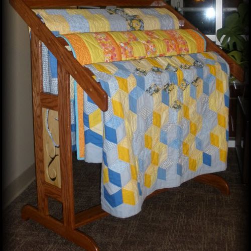 The design purpose of this quilt rack is to hold a