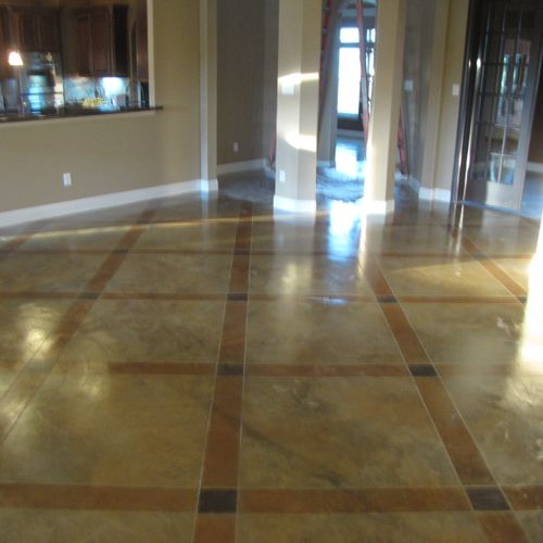Acid stain slab flooring with decorative saw cut p