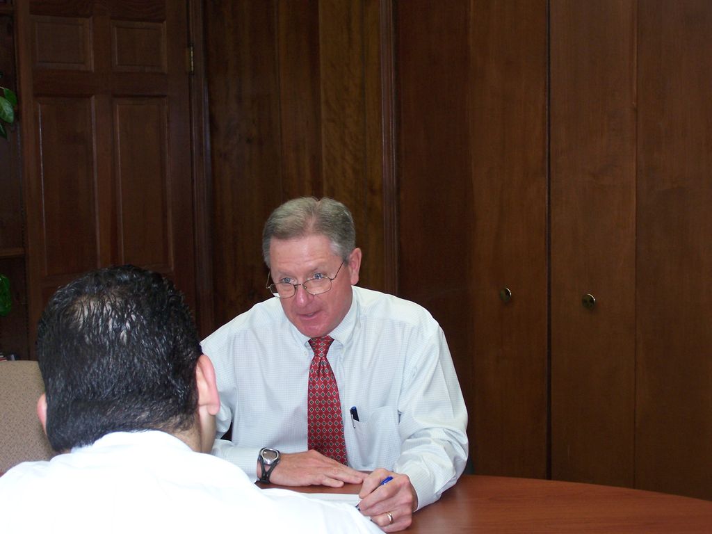 Doug advising a client concerning estate planning 
