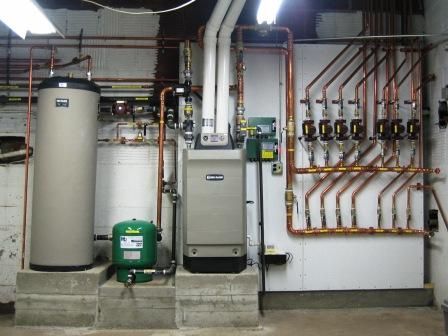 Zoned hot water gas boiler system with domestic wa