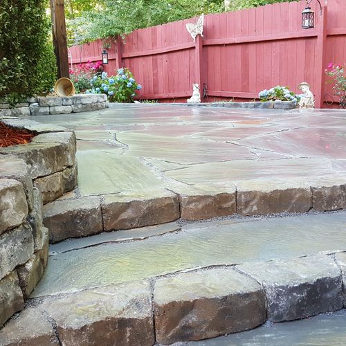 Flagstone patio enlarges your outdoor entertaining