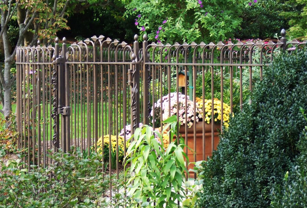 Forged leaves form a softened top around a built-t