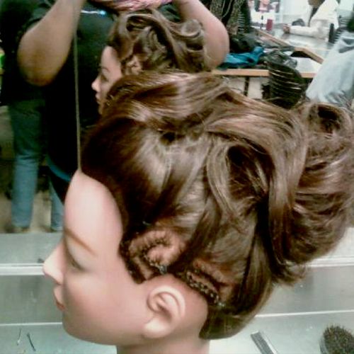 Updo-Drape with conrows on th side