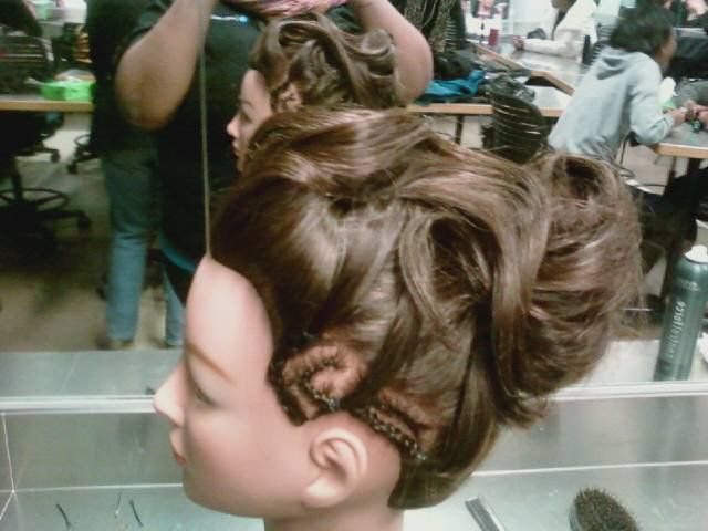 Updo-Drape with conrows on th side