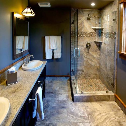 A welcoming guest bathroom with beautiful tile and