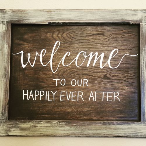 Hand painted rustic welcome sign.  