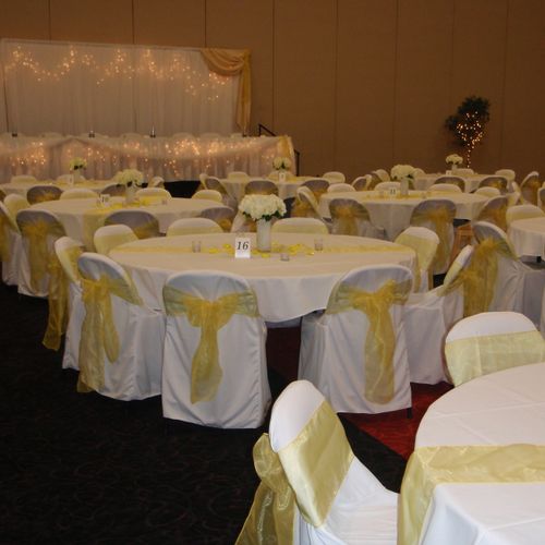 sheer yellow chair sashes and table runners
white 