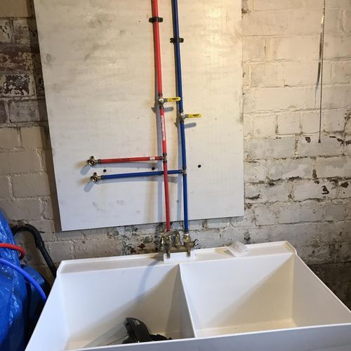 Utility tub , faucet and washer connections