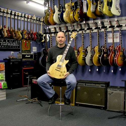 Rick Tedesco, owner of Guitar Hangar in the showro
