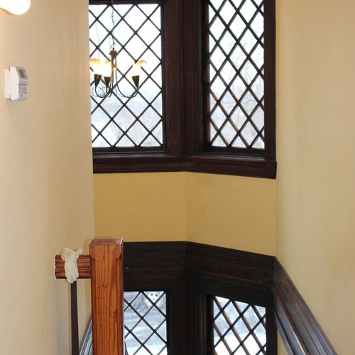 restoration and staining of old wood windows and t