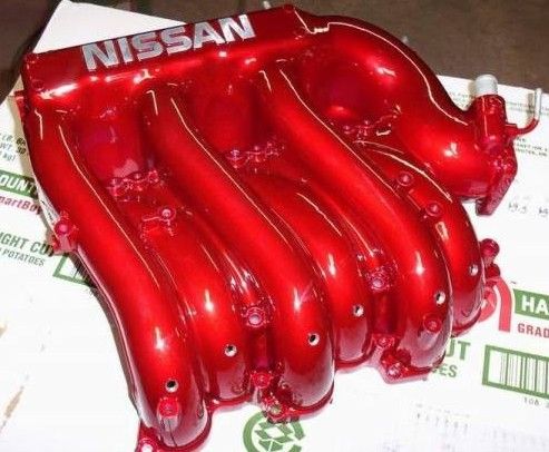 nissan intake in a lollipop red candytop