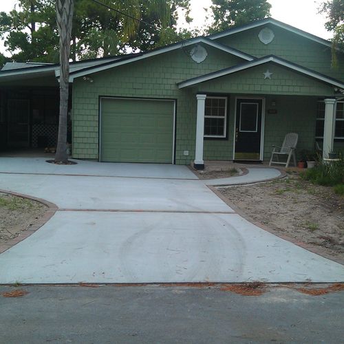 Custom concrete driveway design w/ paver border/ba