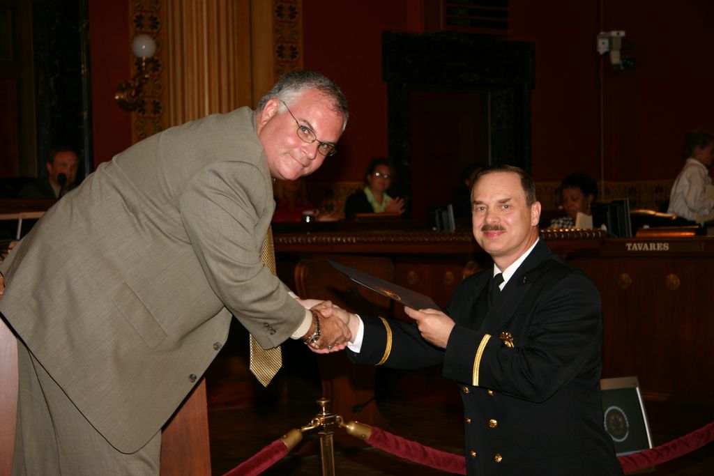 Receiving honor and recognition award from the Cit