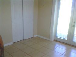 this is the other bedroom same floor tile and door