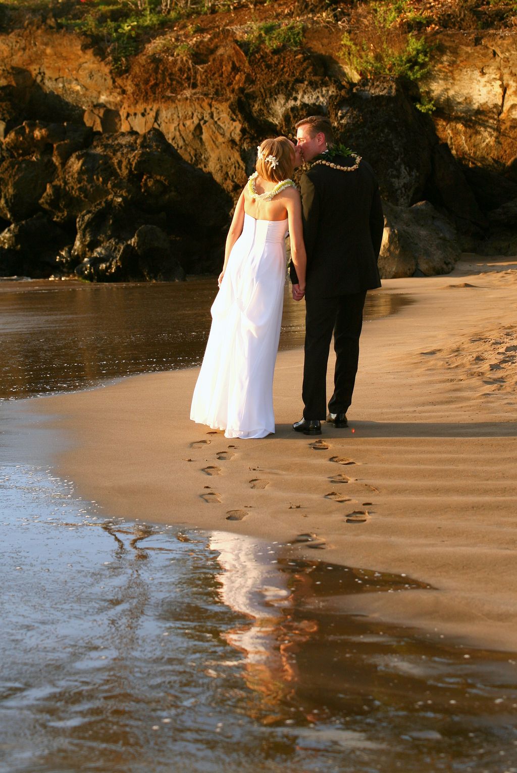 Royal Hawaiian Weddings - strolling on the beach a