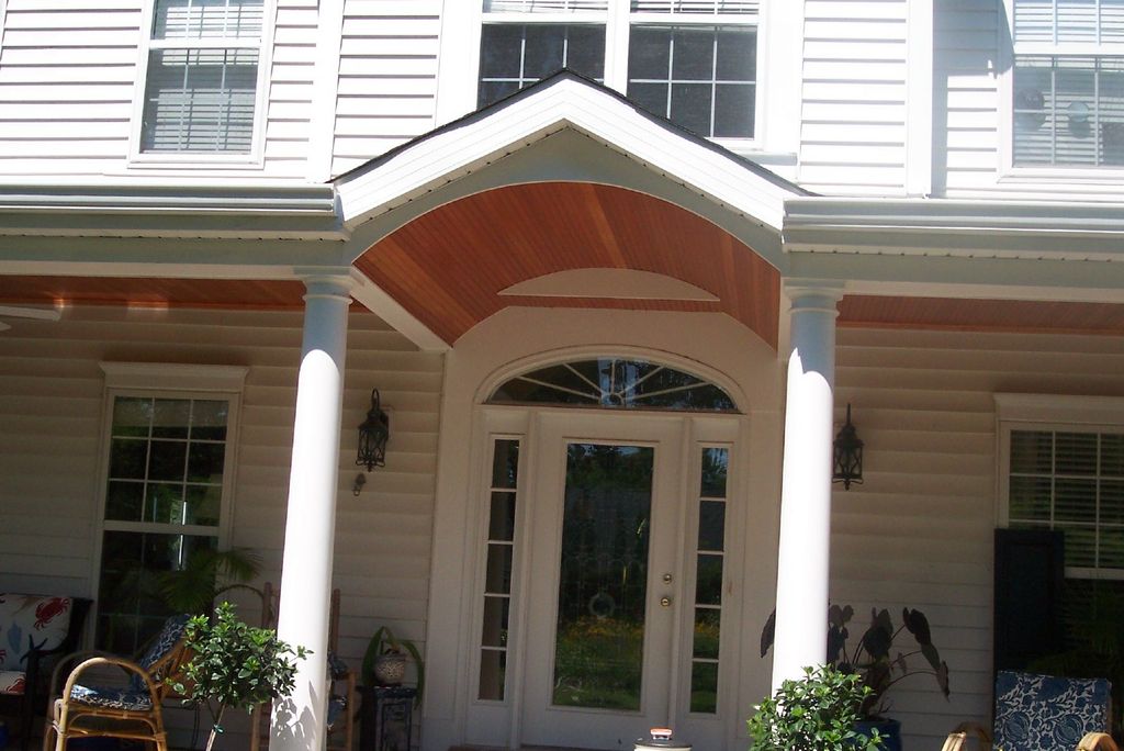 This barrel vault ceiling adds flare to an entry w