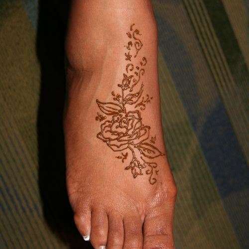A delicate henna rose.