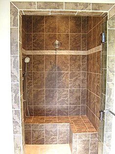 This King Dual Headed Shower with tiled seating is