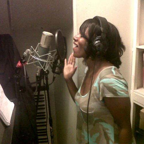 Marlene in the studio, getting recording coaching 