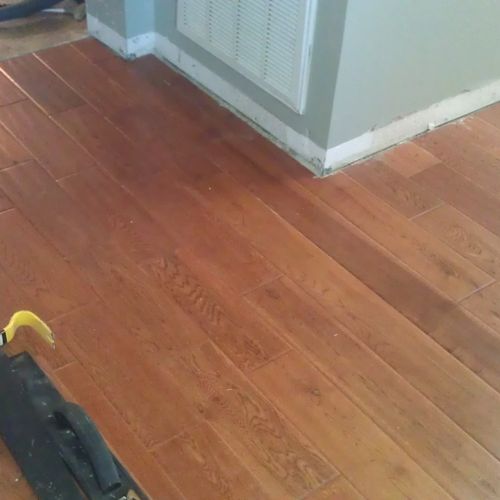 Flooring repair.  Water damaged wood floor, we rep