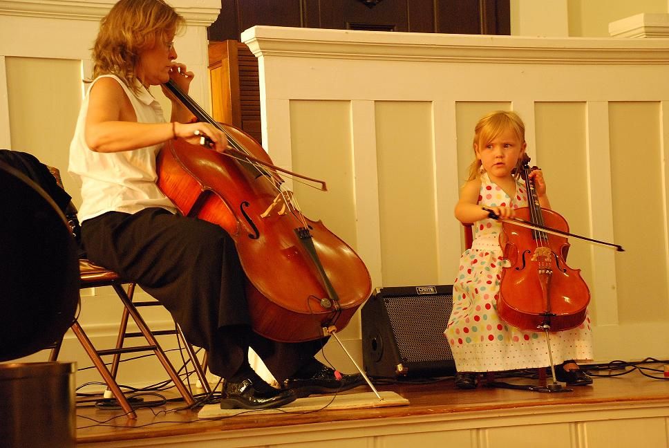 An Alameda benefit concert with a student.