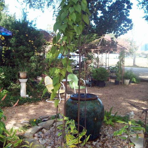 Urn fountain at Garden Dreams display gardens