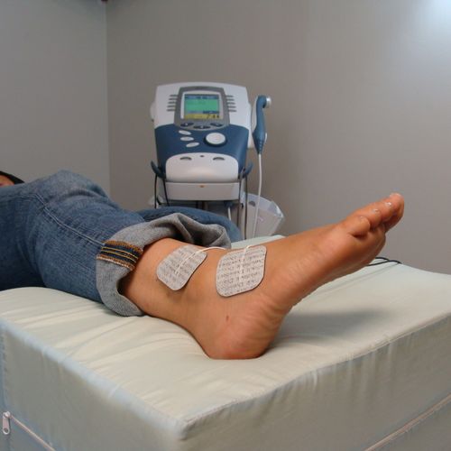 Patient receiving electric stimulation following a